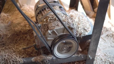 The carpenter cuts the board on a circular saw . Furniture factory Stock Footage 152400104