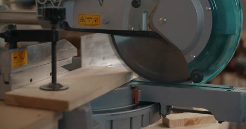 Carpenter cuts wood by automatic circular saw, furniture production, slow motion Video stock 149584564
