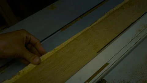 Carpenter Cutting Oak Slab With Table Saw in Workshop Stock Footage 331455684