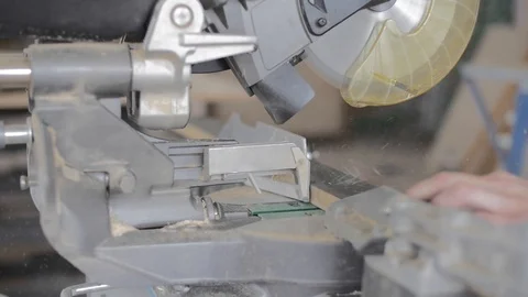 Carpenter cutting with table saw Stock Footage 119377029