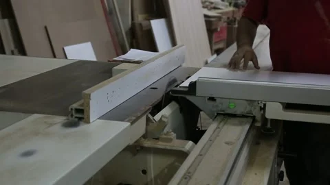 Carpenter Cutting Wood with Circular Saw Stock Footage 340109354