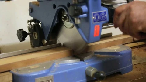 Carpenter Cutting Wood with Concentration Stock Footage 83764525