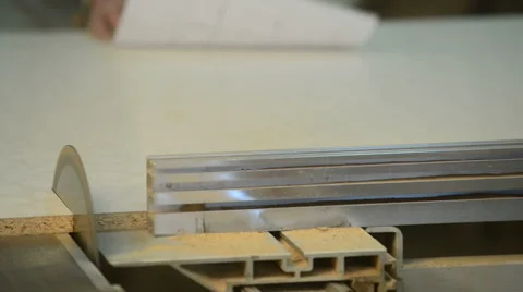 Carpenter cutting the wooden panel with circular saw Stock Footage 43401692