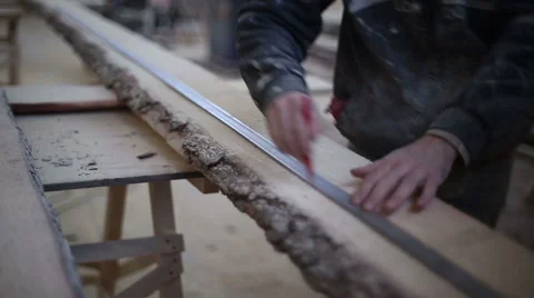 The carpenter draws a line for cutting boards Stock Footage 59520097