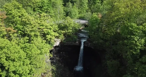 "Carpenter Falls" - Pan Backwards and Tilting Down Stock-Footage 109075408
