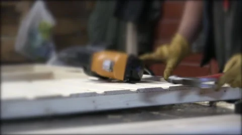 A Carpenter Fix Nails With His Hammer Stock Footage 56264880
