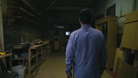 Carpenter goes to workplace Stock Footage