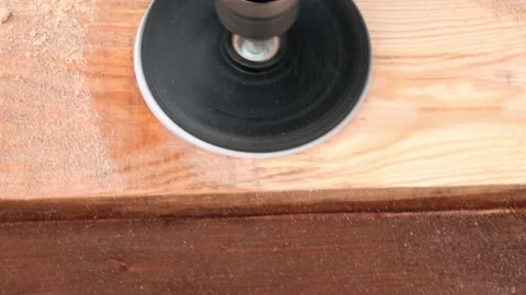 A carpenter grinds a wooden surface using equipment top view. Stock Footage 154329563