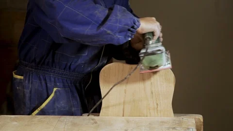 Carpenter handles kitchen Board with Electric grinding machine Stock-Footage 100778548