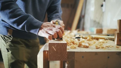 Carpenter handles a wooden board on the table Stock Footage 102452254