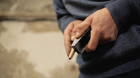 The carpenter handles the wooden element with a small plane, in his hands.4k Stock Footage 105638084