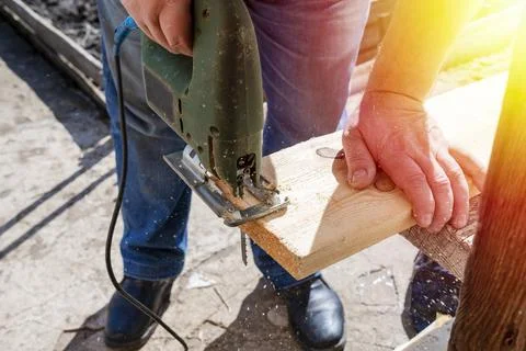 Carpenter a jigsaw Stock Photos