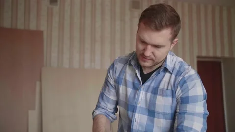 The carpenter knocked himself on the finger, it hurts Stock Footage 153492622