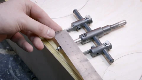 Carpenter makes measurements of instruments for woodworking Stock Footage 194228944