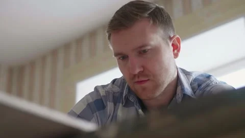 Carpenter makes pencil markings on the blank with the help of a ruler Stock-Footage 153493689