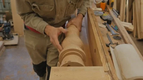 Carpenter making column of harp Stock Footage 79835329