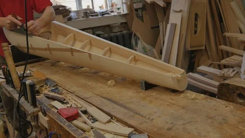 Carpenter making soundbox for harp Stock-Footage 79835725