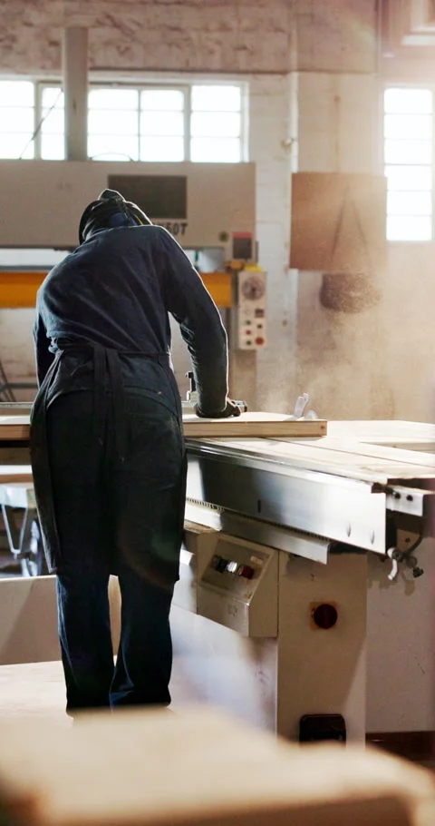 Carpenter, man and workshop with table saw for manufacturing, production and Stock Footage 340755289