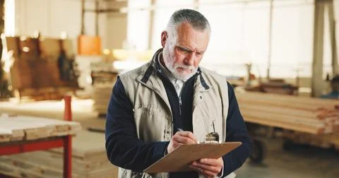 Carpenter, man and writing in workshop with clipboard, quality control Stock Photos