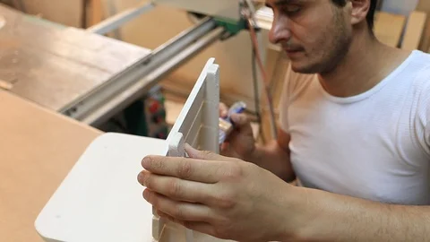 Carpenter Man Work Use Paintbrush on Child Wood Chair Carpentry Factory Activity Stock Footage 110091163