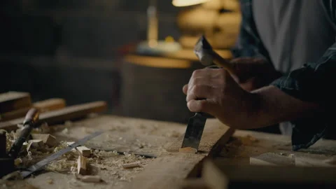 Carpenter, Man Works with a chisel knock... | Stock Video | Pond5
