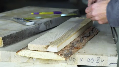 Carpenter measures the item Stock Footage 102251981