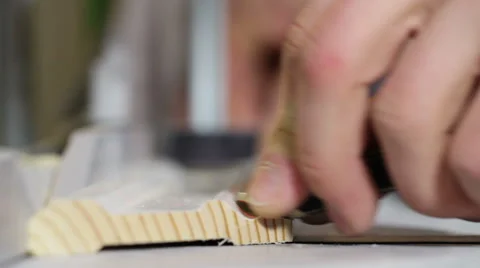 Carpenter measures, marks and cuts a piece of wood Stock Footage 53063856