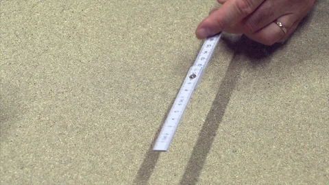Carpenter measures the material Stock Footage 90950810