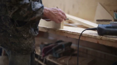 The carpenter measures with a ruler and pencil making marks Stock Footage 59520612