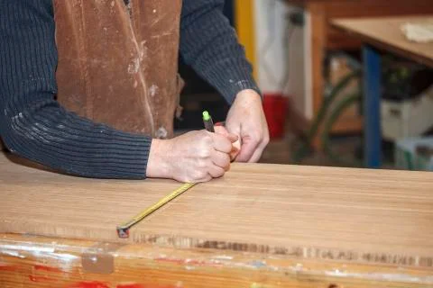 Carpenter measuring Stock Photos