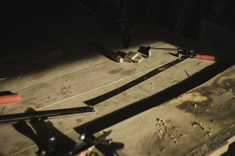 A carpenter office desk inside a small carpentry workshop showing tools for h Stock Photos