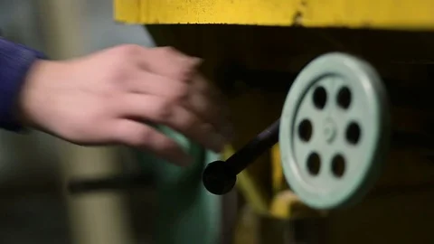 Carpenter operating electric planer in workshop Stock Footage 73303250