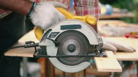 Carpenter or craftsman works by using machine to work on the construction site. Stock Footage 132083644