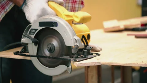 Carpenter or craftsman works by using machine to work on the construction site. Stock Footage 132083662