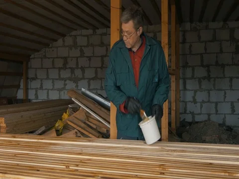 The carpenter painter processes the wood material for repair. Stock Footage 73250712
