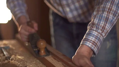 Carpenter planed wood, workplace. Slow motion Stock Footage 74013423