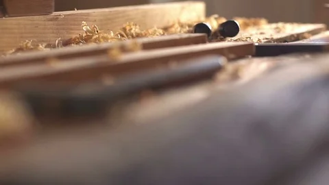 Carpenter planed wood, workplace. Slow motion Stock Footage 74013424