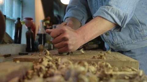 Carpenter with a planer at work in the workshop. Slow-motion close-up Video stock 131966300