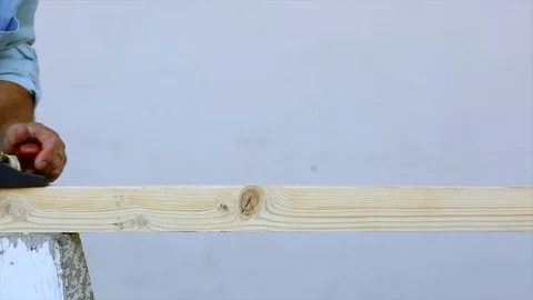 Carpenter Planing Wood Stock Footage 81196946