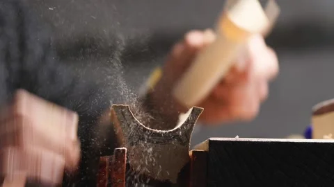 Carpenter polishes poplar tea leaf holder with sanding paper.handmade concept Stock Footage 147871534