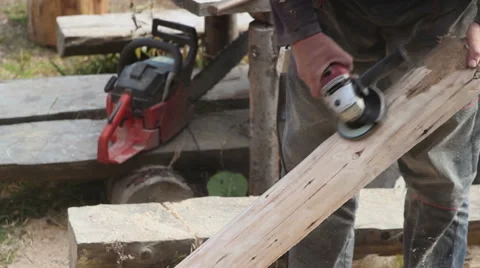Carpenter polishing timber, close-up Stock Footage 64310222