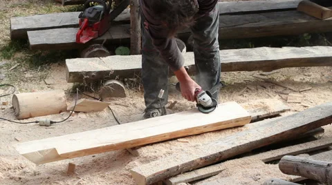 Carpenter polishing timber using electric grinder Stock Footage 58241481