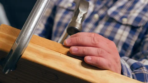 Carpenter Pounds Nail in Workshop 4K UHD Stock Footage 38416586