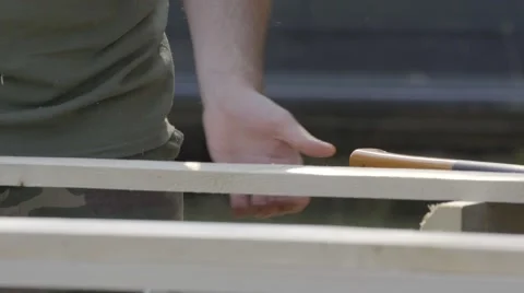 CARPENTER PREPARING BOARDS TO CUT Stock Footage 68859248