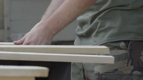 CARPENTER PREPARING BOARDS TO CUT Stock Footage 68859323