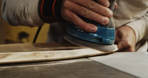 Carpenter Processing Wood With Sander Stock-Footage 125894056