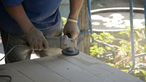 Carpenter s hands sanding plank using power Video stock 83792442