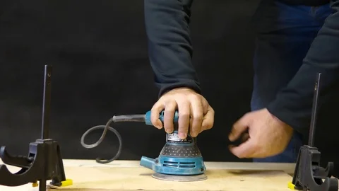 Carpenter Sanding Wood In Workshop Stock Footage 93253904