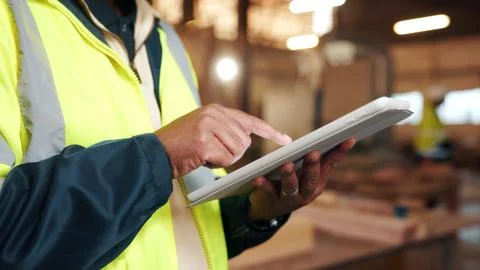 Carpenter, scroll and hands with tablet in workshop, manufacturing or track.. Stock-Fotos