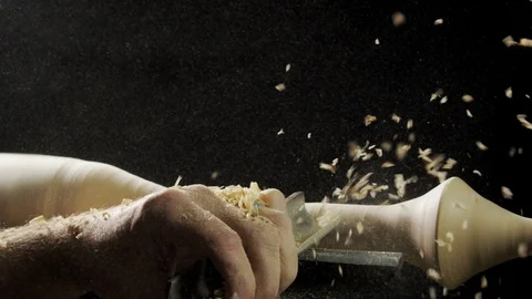 Carpenter shaping the wood with a chisel in the workshop Stock Footage 104220027